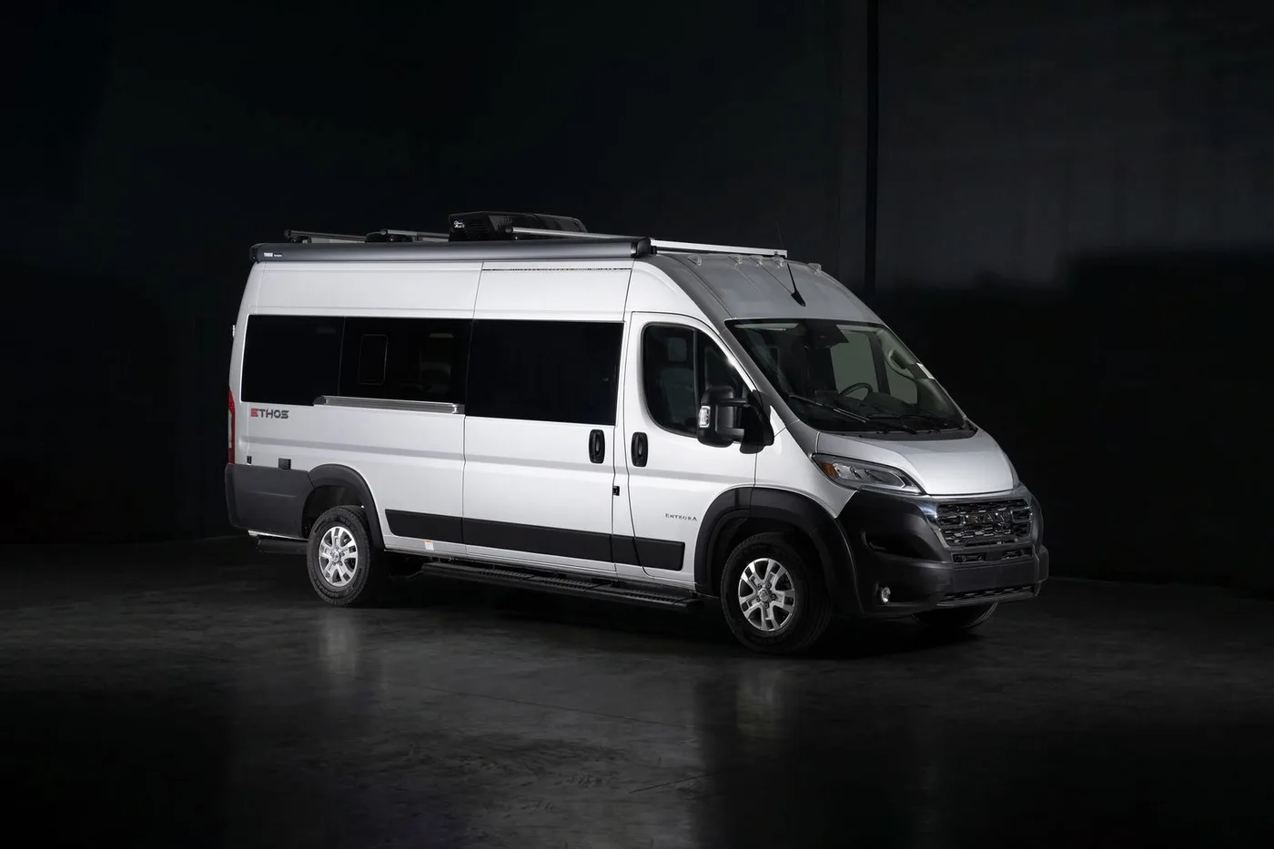 Entegra Coach Ethos Class B camper van parked at a campsite