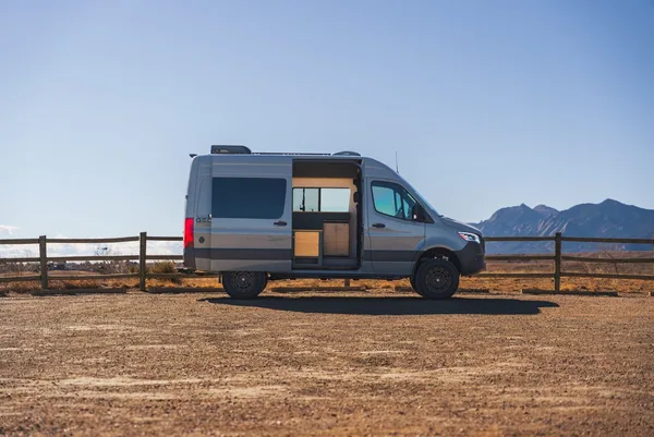 GeoTrek Bear Peak camper van parked at an outdoor campsite