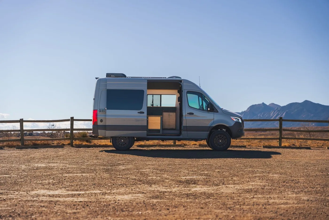 GeoTrek Flatiron camper van parked on a mountain road
