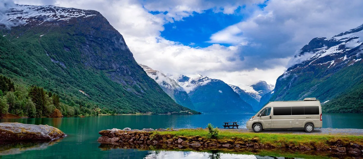 Roadtrek Simplicity Class B camper van parked on a scenic road