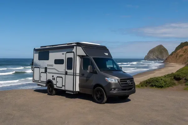 Winnebago EKKO AWD camper van parked at a remote outdoor campsite
