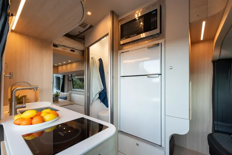 Noovo Plus walnut interior with full kitchen